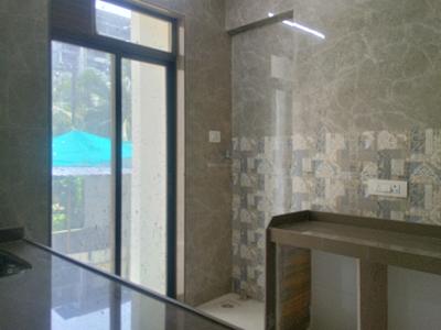 Kitchen Image of 1070 Sq.ft 2 BHK Apartment / Flat for sale in Regency Antilia Phase V Avana, Ulhasnagar Thane for Rs. 6900000