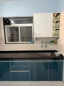 Kitchen Image of 990 Sq.ft 2 BHK Apartment / Flat for rent in Mohan NagarSociety, Baner Pune for Rs. 35000