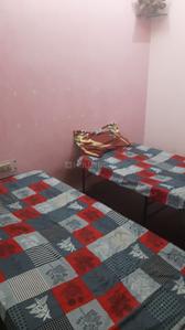 Bedroom Image of Sri Balaji PG in Jhilmil Colony, New Delhi