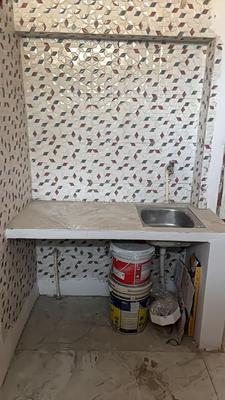 Kitchen Image of 720 Sq.ft 1 RK Builder Floor for rent in Signature View Apartment, Mukherjee Nagar New Delhi for Rs. 8500