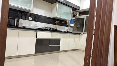 Kitchen Image of 1080 Sq.ft 2 BHK Apartment / Flat for rent in Adani The Meadows, Shantigram Ahmedabad for Rs. 35000