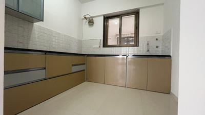 Kitchen Image of 1050 Sq.ft 2 BHK Apartment / Flat for rent in Raja Bahadur Pittie Kourtyard D Tower, Kharadi Pune for Rs. 41000