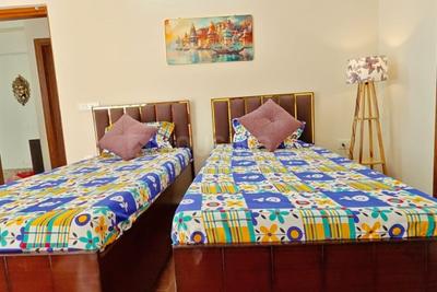 Bedroom Image of OLE STAYS Tech Zone IV, Amrapali Dream Valley in Noida Extension, Greater Noida