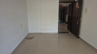 Living Room Image of 900 Sq.ft 2 BHK Apartment / Flat for sale in Kolte Patil Margosa Heights, Mohammed Wadi Pune for Rs. 4500000