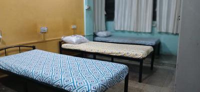 Bedroom Image of Ashwini p g in Koregaon Park, Pune