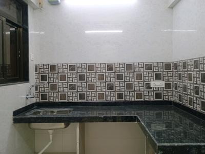 Kitchen Image of 884 Sq.ft 2 BHK Apartment / Flat for sale in Kulswamini Sukrya Heights, Dombivli West Thane for Rs. 6188000