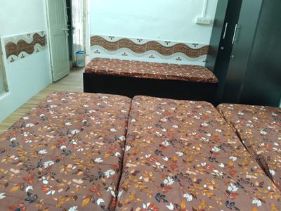 Bedroom Image of Radhe Krishna Pg in Memnagar, Ahmedabad