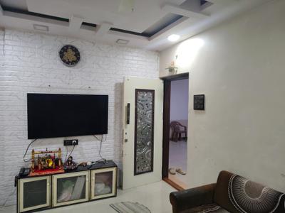 Living Room Image of 700 Sq.ft 1 BHK Apartment / Flat for rent in Paradigm Pushpanjali Residency Phase III, Kasarvadavali Thane for Rs. 16548
