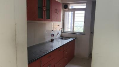 Kitchen Image of 1050 Sq.ft 2 BHK Apartment / Flat for sale in Puraniks Home Town, Kasarvadavali Thane for Rs. 11000000