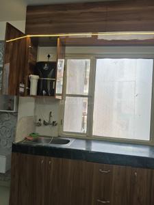 Kitchen Image of 700 Sq.ft 2 BHK Builder Floor for rent in Guru Ji Delhi Residency, Dwarka Mor New Delhi for Rs. 19400