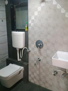 Common Bathroom Image of 600 Sq.ft 1 BHK Apartment / Flat for sale in Tharwani Vedant Nakshatra, Badlapur West Badlapur for Rs. 2900000