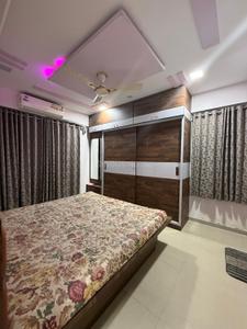 Bedroom Image of 1268 Sq.ft 2 BHK Apartment / Flat for rent in Prathna Greens, Sargasan Gandhinagar for Rs. 25000