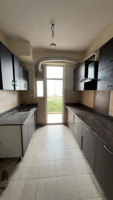 Kitchen Image of 1000 Sq.ft 2 BHK Apartment / Flat for rent in Arihant Arden, Noida Extension Greater Noida for Rs. 19000
