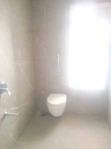 Common Bathroom Image of 1325 Sq.ft 2 BHK Apartment / Flat for sale in Hallmark Skyrena, Puppalaguda Hyderabad for Rs. 13200000