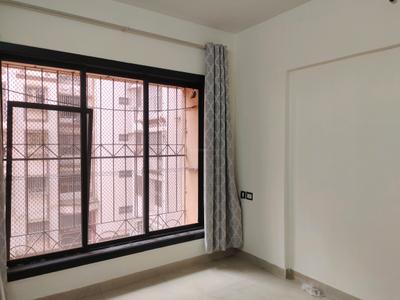 Bedroom Image of 575 Sq.ft 1 BHK Apartment / Flat for rent in Atul Blue Empire, Kandivali West Mumbai for Rs. 35000