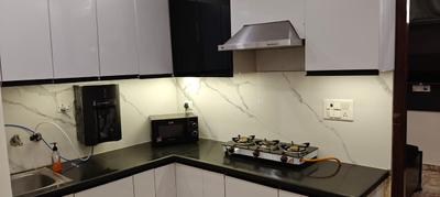 Kitchen Image of 900 Sq.ft 2 BHK Builder Floor for rent in Rajouri Garden New Delhi for Rs. 36000