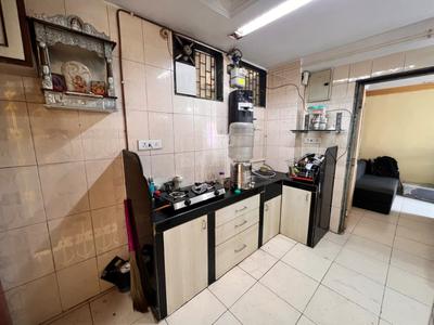 Kitchen Image of 450 Sq.ft Studio Apartment / Flat for rent in Chatrapati Shivaji Raje Complex, Kandivali West Mumbai for Rs. 35000