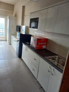 Kitchen Image of 435 Sq.ft 1 RK Apartment / Flat for rent in Paramount Pine And Oak Studio, Surajpur Greater Noida for Rs. 15250