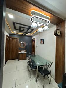 Living Room Image of 900 Sq.ft 3 BHK Apartment / Flat for sale in Madhapar Rajkot for Rs. 5600000