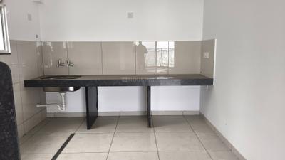Kitchen Image of 1000 Sq.ft 3 BHK Apartment / Flat for sale in Sarthak Optima Heights, Wagholi Pune for Rs. 6000000