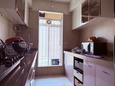 Kitchen Image of 900 Sq.ft 2 BHK Apartment / Flat for rent in Dosti West County, Thane West Thane for Rs. 35000