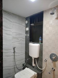 Common Bathroom Image of 700 Sq.ft 1 BHK Apartment / Flat for rent in Rosa Elite, Thane West Thane for Rs. 16000