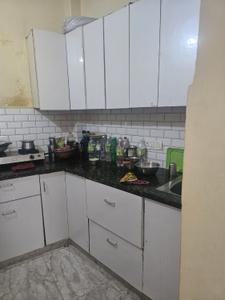 Kitchen Image of 900 Sq.ft 2.5 BHK Builder Floor for sale in Ramesh Nagar New Delhi for Rs. 6900000