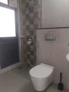Common Bathroom Image of 550 Sq.ft 1 BHK Apartment / Flat for sale in Mahindra Roots, Kandivali East Mumbai for Rs. 13000000