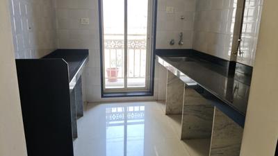 Kitchen Image of 635 Sq.ft 1 BHK Apartment / Flat for sale in Rosa Royale, Hiranandani Estate Thane for Rs. 8200000