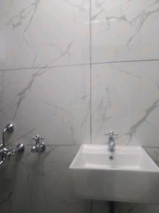 Common Bathroom Image of 1006 Sq.ft 2 BHK Apartment / Flat for sale in Provident Bayscape, Kelambakkam Chennai for Rs. 6500000