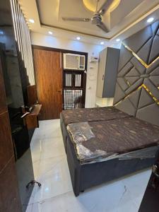 Bedroom Image of 500 Sq.ft 2 BHK Builder Floor for rent in Dwarka Mor New Delhi for Rs. 21000