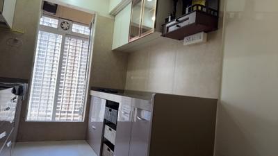 Kitchen Image of 900 Sq.ft 2 BHK Apartment / Flat for rent in Dosti West County, Thane West Thane for Rs. 35000