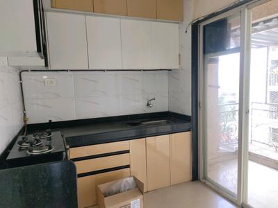 Kitchen Image of 1095 Sq.ft 2 BHK Apartment / Flat for rent in Balaji Amrit, Ulwe Navi Mumbai for Rs. 35000