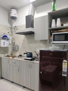 Kitchen Image of 650 Sq.ft 1 RK Builder Floor for rent in CGHS Peach Jasmine, Sector 31 Gurgaon for Rs. 22000