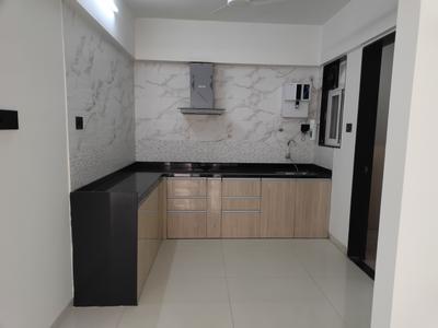 Kitchen Image of 940 Sq.ft 2 BHK Apartment / Flat for rent in Krisna Nirmaan Amorapolis, Dhanori Pune for Rs. 26000
