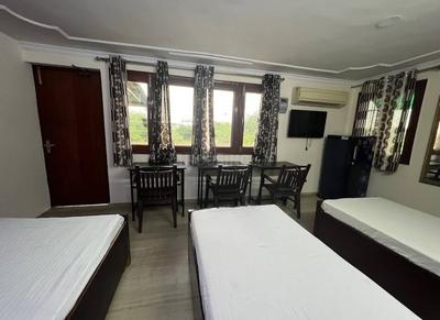 Bedroom Image of Juneja &amp; Royal Stay PG in Lajpat Nagar, New Delhi