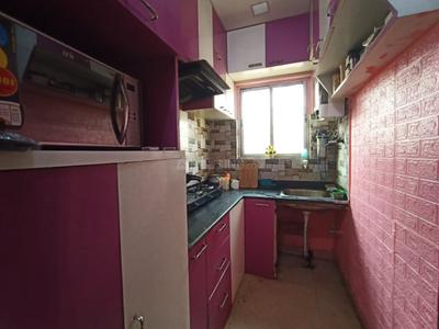 Kitchen Image of 1000 Sq.ft 2 BHK Apartment / Flat for sale in Purbalok Kolkata for Rs. 4400000