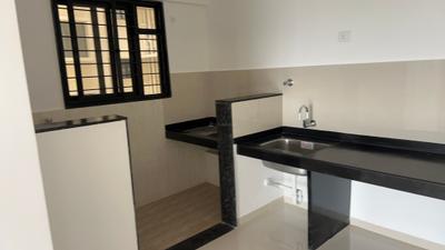 Kitchen Image of 950 Sq.ft 3 BHK Apartment / Flat for rent in Kohinoor Sportsville, Maan Pune for Rs. 35999