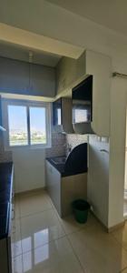 Kitchen Image of 523 Sq.ft 1 BHK Apartment / Flat for rent in Urbanrise Revolution One, Padur Chennai for Rs. 22000