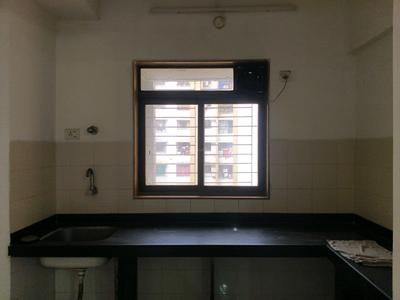 Kitchen Image of 584 Sq.ft 1 BHK Apartment / Flat for sale in Lodha Casa Bella Gold, Usarghar Thane for Rs. 3100000