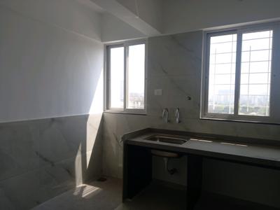 Kitchen Image of 938 Sq.ft 2 BHK Apartment / Flat for sale in Infini Jagtap City, Charholi Budruk Pune for Rs. 7000000