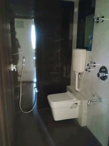 Common Bathroom Image of 583 Sq.ft 1 BHK Apartment / Flat for sale in Rudis Shivalaya Heights, Khidkali Thane for Rs. 3620000