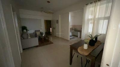 Living Room Image of 1050 Sq.ft 2 BHK Apartment / Flat for sale in Raj Nagar Extension Ghaziabad for Rs. 7100000