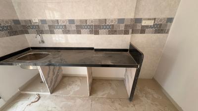 Kitchen Image of 1149 Sq.ft 2 BHK Apartment / Flat for sale in Shivparvati Shreeji Glacia, Ulwe Navi Mumbai for Rs. 8850000