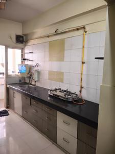 Kitchen Image of 1100 Sq.ft 2 BHK Apartment / Flat for rent in Kameshwar Annex, Motera Ahmedabad for Rs. 25000