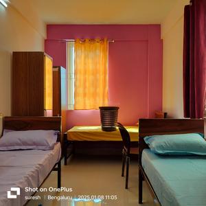 Bedroom Image of Sri Shanmukha luxury stay for ladies  in Thirumanahalli, Bengaluru