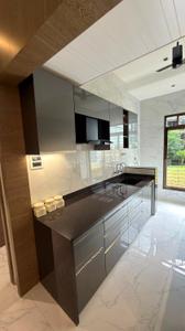 Kitchen Image of 740 Sq.ft 1 BHK Apartment / Flat for sale in Mohan Alcoves I, Badlapur West Badlapur for Rs. 2800000