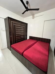 Bedroom Image of 672 Sq.ft 2 BHK Apartment / Flat for rent in Ashtavinayak City, Fursungi Pune for Rs. 24000