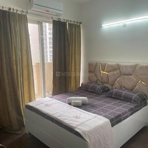Bedroom Image of 1285 Sq.ft 2 BHK Apartment / Flat for sale in Bulland Heights, Crossings Republik Ghaziabad for Rs. 7650000
