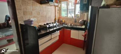 Kitchen Image of 680 Sq.ft 1 BHK Apartment / Flat for rent in Spine Road Pune for Rs. 18500